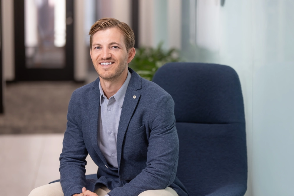 portrait of a smiling person in professional attire